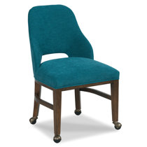 Upholstered dining chairs with deals arms and casters